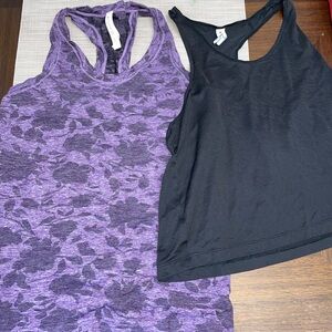 Woman’s size medium Athleta brand tank tops